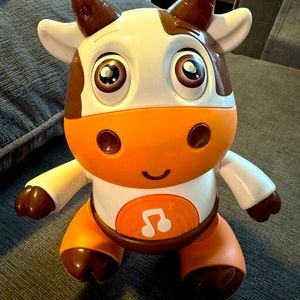 Dancing musical cow toy